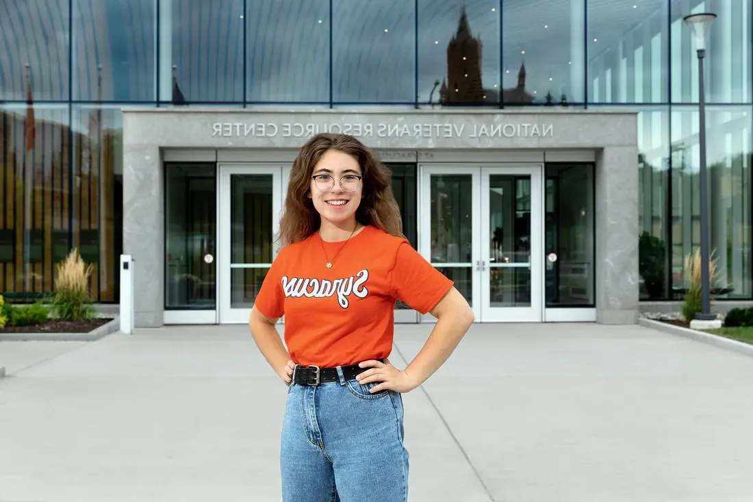 GI Bill veteran student standing outside smiling.